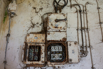 Old electrical cabinet with safety fuses and switches