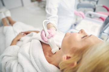 Obraz na płótnie Canvas Close up of blonde female being in clinic