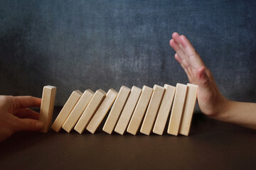 The child plays with wooden sticks, holds with his hand. The concept of training and education of young children.