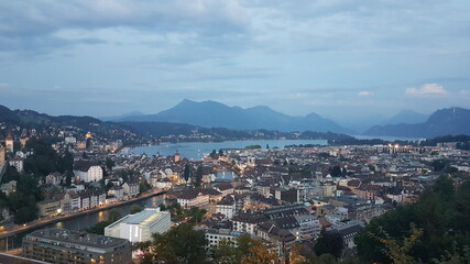 Sunset, evening, night Lucerne city aerial view from Château Gütsch in summer, a historic château (castle) in Lucerne, Switzerland, panorama of the city