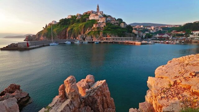 Morning cityscape of Vrbnik town. Summer seascape of Adriatic sea, Krk island, Kvarner bay archipelago, Croatia, Europe. Beautiful world of Mediterranean countries. Full HD video (High Definition).