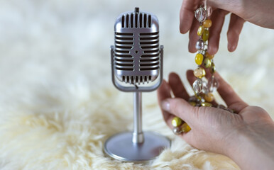asmr microphone with hands and beads