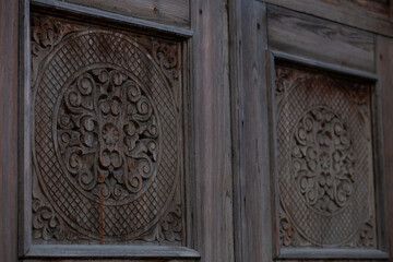 old wooden door with carving