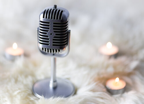 asmr microphone on fur with candles
