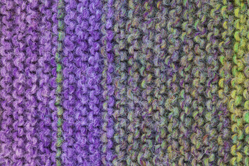 knitted wool texture background purple and green