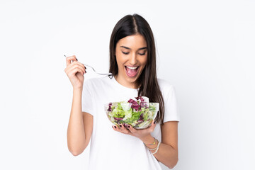 Young woman with salad isolated on white background