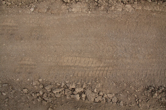 Tire tracks on the road .Texture or background