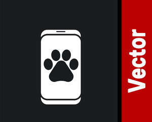 White Veterinary clinic symbol icon isolated on black background. Cross hospital sign. A stylized paw print dog or cat. Pet First Aid sign. Vector.