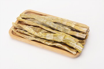 Freshly dried bamboo shoots on a white background