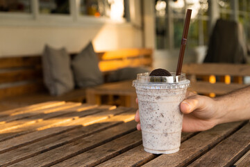 Milkshake with ice cream and oreo cookies. Cool and refreshing on a hot day