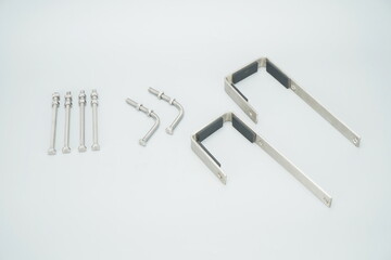 Metal brackets for planters on a white background.