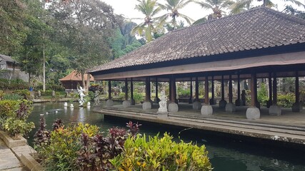 Obraz premium Gunung Kawi Sebatu Temple with water, pond view in summer, one of the least visited temple, located in Bali Island, Indonesia