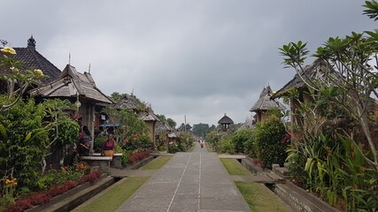 Fototapeta na wymiar Penglipuran Village in summer, a traditional villages located in Bangli Regency, Bali Province (Bali island), Indonesia 