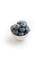 Fresh blueberry close-up isolated on a white background. Shallow depth of field. Healthy and dietary food concept. Fresh berries.