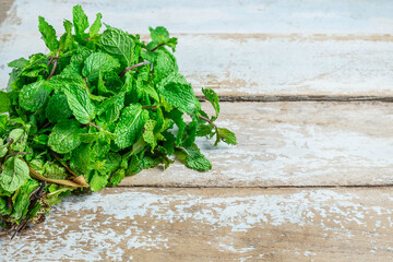 Mint herbs on a wooden table