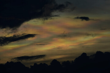 Rainbow cloud in an evening sky