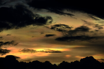 Rainbow cloud in an evening sky