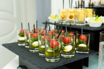 Festive buffet table with many snacks and appetizers
