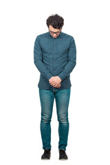 Full length portrait of sad businessman looking down ashamed, feels guilty and has remorse isolated...
