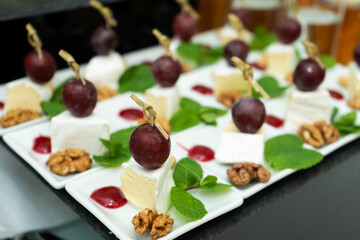 Festive buffet table with many snacks and appetizers