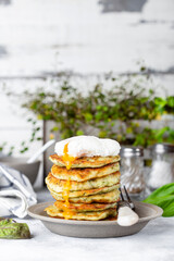 zucchini fritters or pancakes with dill and poached egg