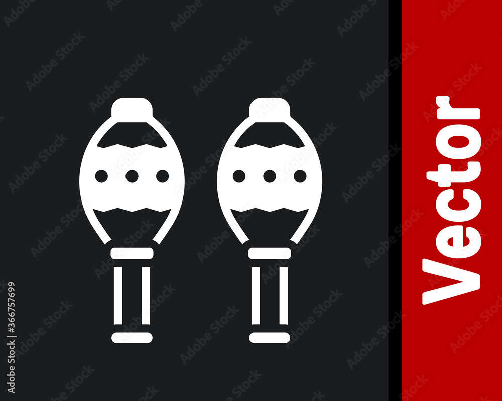 Wall mural white maracas icon isolated on black background. music maracas instrument mexico. vector.