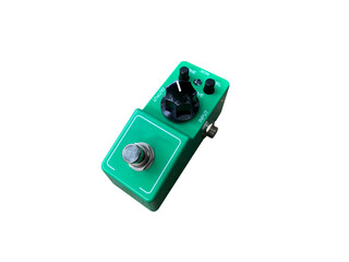 Isolated green mini overdrive, distortion stompbox electric guitar effect for studio and stage...