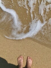 feet on the beach
