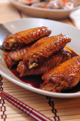 A Plate Of Marinated Chicken Wings