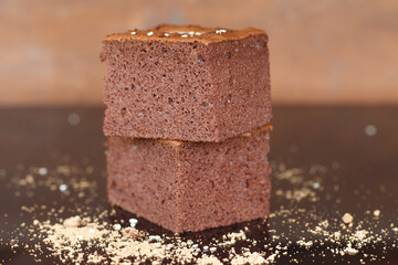 Close up homemade chocolate brownies in warn light