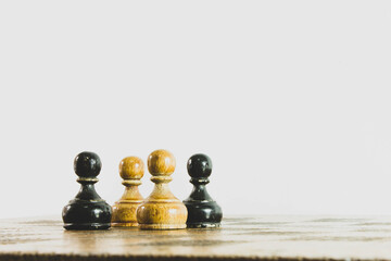 Black and white chess pawn on the center of board