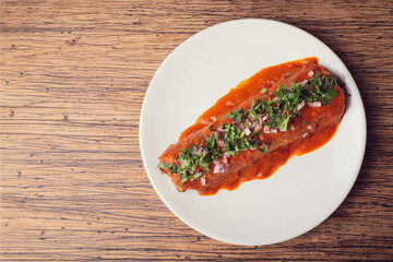 Traditional mexican gourmet food. Gourmet mexican food with chili peppers. Mexican traditional food gourmet on table. Exotic mexican food. Mexican burrito.