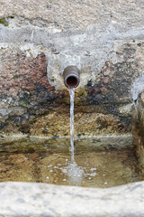 Fountain with a running water pipe in Candelario, Salamanca, Castilla Leon, Spain, Europe.