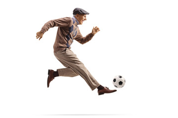 Active elderly man playing football