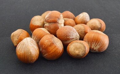 tasty hazelnuts, isolated on black background