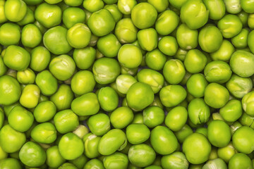 Background from fresh green peas. Green vegetable.