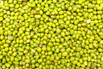 Heap of raw mung beans as background
