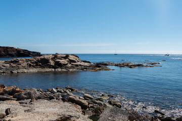 Fototapeta na wymiar Rocky shore of the Mediterranean Sea in Spain on a beautiful sunny day