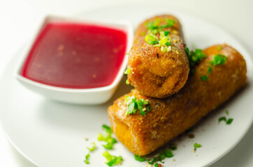 Delicious croquettes with sauerkraut and mushrooms served with hot red borscht