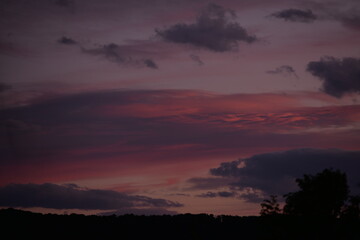Naklejka premium colorful clouds in the sky at sunset