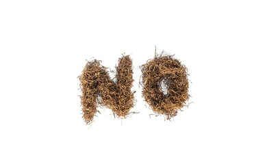 pile of tobacco arrange as "no" message isolated on white background from top view with copy space.concept for world tobacco, quit smoking , against narcotic.