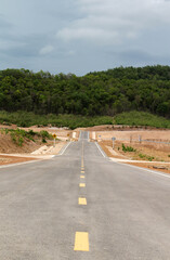 Beautiful local asphalt road way in Mae Moh district, Lampang Province, Northern Thailand.