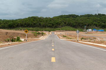 Beautiful local asphalt road way in Mae Moh district, Lampang Province, Northern Thailand.