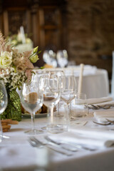 table set up for dinner, elegant and white