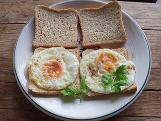 fried egg on slice breads