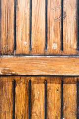 Old wooden planks in the village. Vintage countryside fence. Rustic texture background for writing text