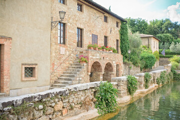 Fototapeta na wymiar Thermal baths in the medieval village Bagno Vignoni, Tuscany Italy