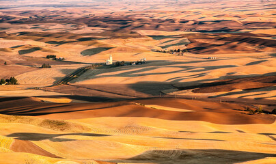 A patchwork of wheat stubble fields in the fall in the palouse wheat country in southeastern...