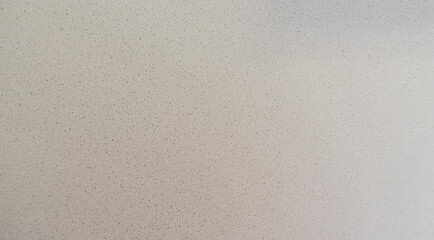 gey and white speckled wall