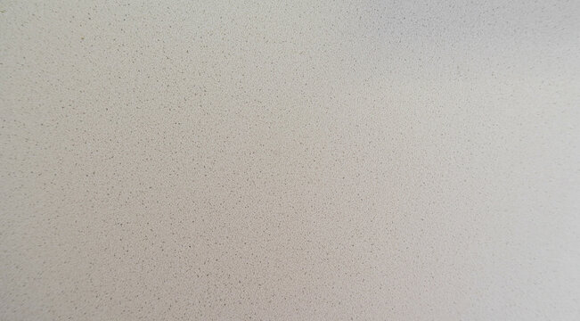 gey and white speckled wall